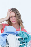 Woman looking at dirty clothes