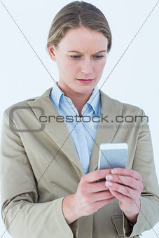 Businesswoman using her mobile phone