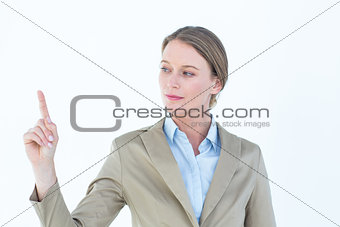 Businesswoman pointing with her finger