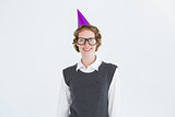 Geeky hipster wearing a party hat