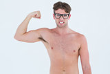 Geeky hipster posing topless