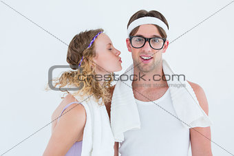 Geeky hipster kissing her boyfriend
