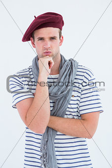 French guy with beret looking at camera