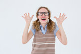 Geeky hipster woman smiling and showing her hands