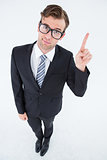 Geeky hipster businessman with finger up