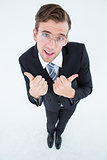 Geeky businessman with thumbs up