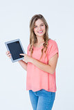 Hipster woman showing tablet pc