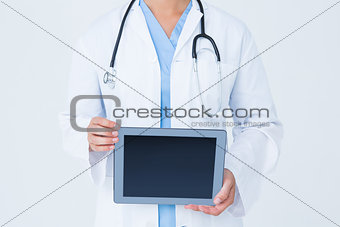 Doctor showing tablet pc