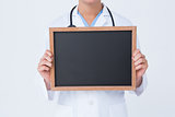 Doctor showing little blackboard