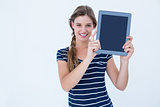 Woman showing tablet pc
