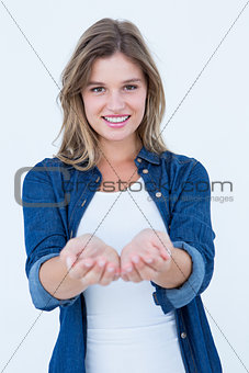 Pretty hipster presenting her hands