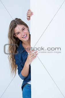 Woman holding poster