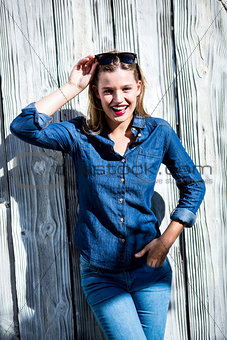 Pretty woman with hand in pocket