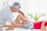 Man having thigh massage