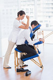 Businessman having back massage