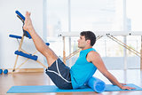 Man exercising with foam roller