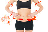 Composite image of closeup mid section of a fit woman with hands on stomach