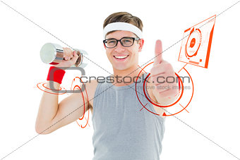 Composite image of geeky hipster posing in sportswear with dumbbell