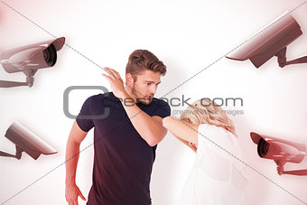 Composite image of angry man about to hit his girlfriend