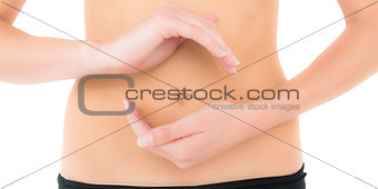 Closeup mid section of a fit woman with hand gestures