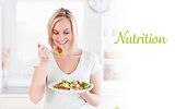 Nutrition against gorgeous woman eating salad