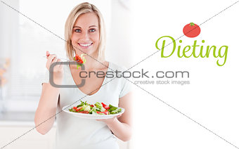 Dieting against close up of a cute woman eating salad