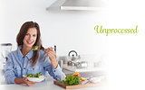 Unprocessed against woman eating a vegetarian salad