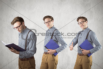 Composite image of nerd with notebook