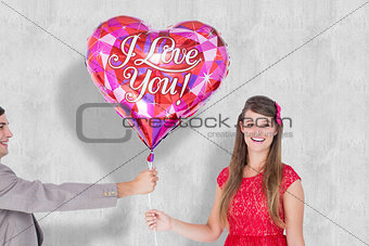 Composite image of geeky hipster offering red heart shape balloon to his girlfriend