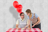 Composite image of geeky hipster couple celebrating his birthday