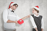 Composite image of geeky hipster offering present to his girlfriend