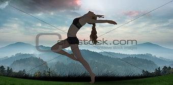 Composite image of side view of a sporty young woman stretching