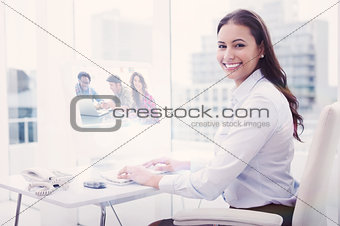 Composite image of creative team working