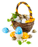 Easter eggs in basket on a white background