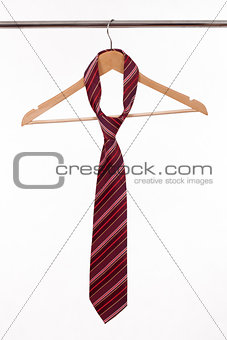 Hanger for clothes with tie
