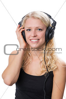 Young blond girl wearing headphones