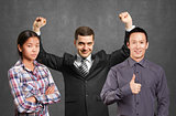 Asian team and businessman with hands up