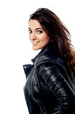 Dashing young girl in leather jacket