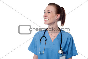 Smiling young female doctor posing