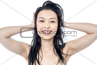 Beautiful woman with hand in hair