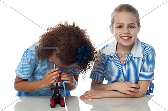 Two school kids doing research