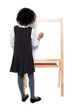 School girl writing on white board