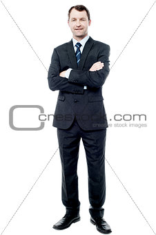 Happy young businessman smiling