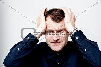 Man having headache isolated over white