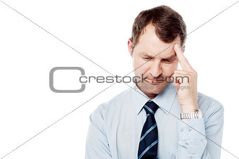 Middle aged man having headache