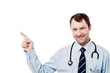 Male physician pointing at something