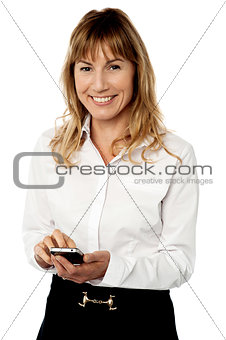 Business executive using her mobile
