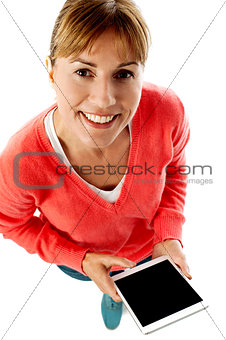 Woman holding new tablet pc, aerial view