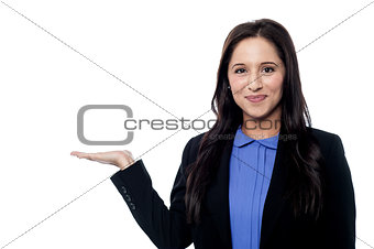 Smiling sales woman presenting something