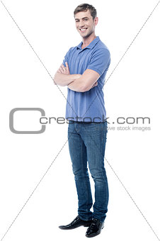 Smart young man with crossed arms